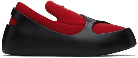 Ferragamo: Black & Red Lunar Sneakers .